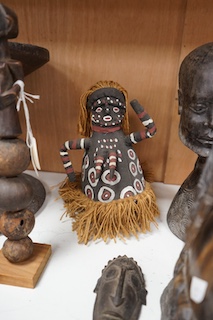 Two African tribal busts, two carved spoons and three carved Kamba Kenyan stools (11). Largest stool 28cm high. Condition - mostly good, some staining to seat of largest stool